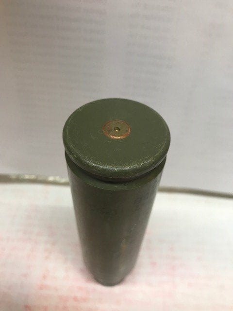 25mm Bushmaster fair to good once fired steel case.