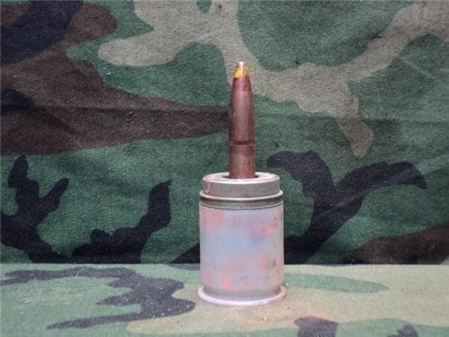 M79/203 – Metal pusher with 50 cal spotter projectile glued into pusher. (this is not a live round)