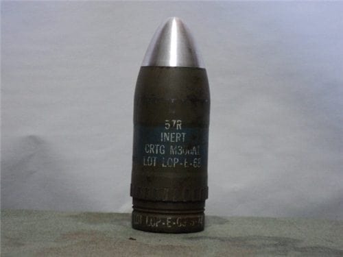 57mm recoiless inert projectile with nose fuse. Readable writing marked 57R inert ctg. M806 A1