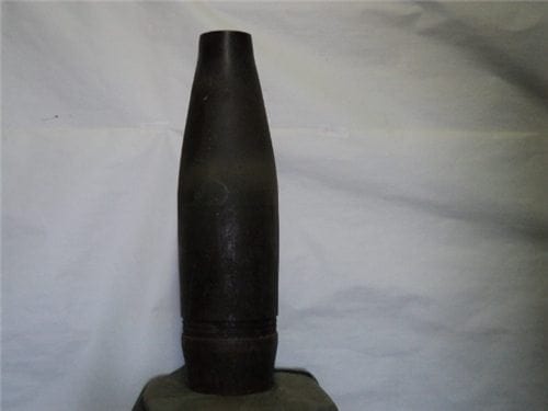 6 inch projectile, nice condition, without driving band or fuse, upper part has strange taper and nose shape